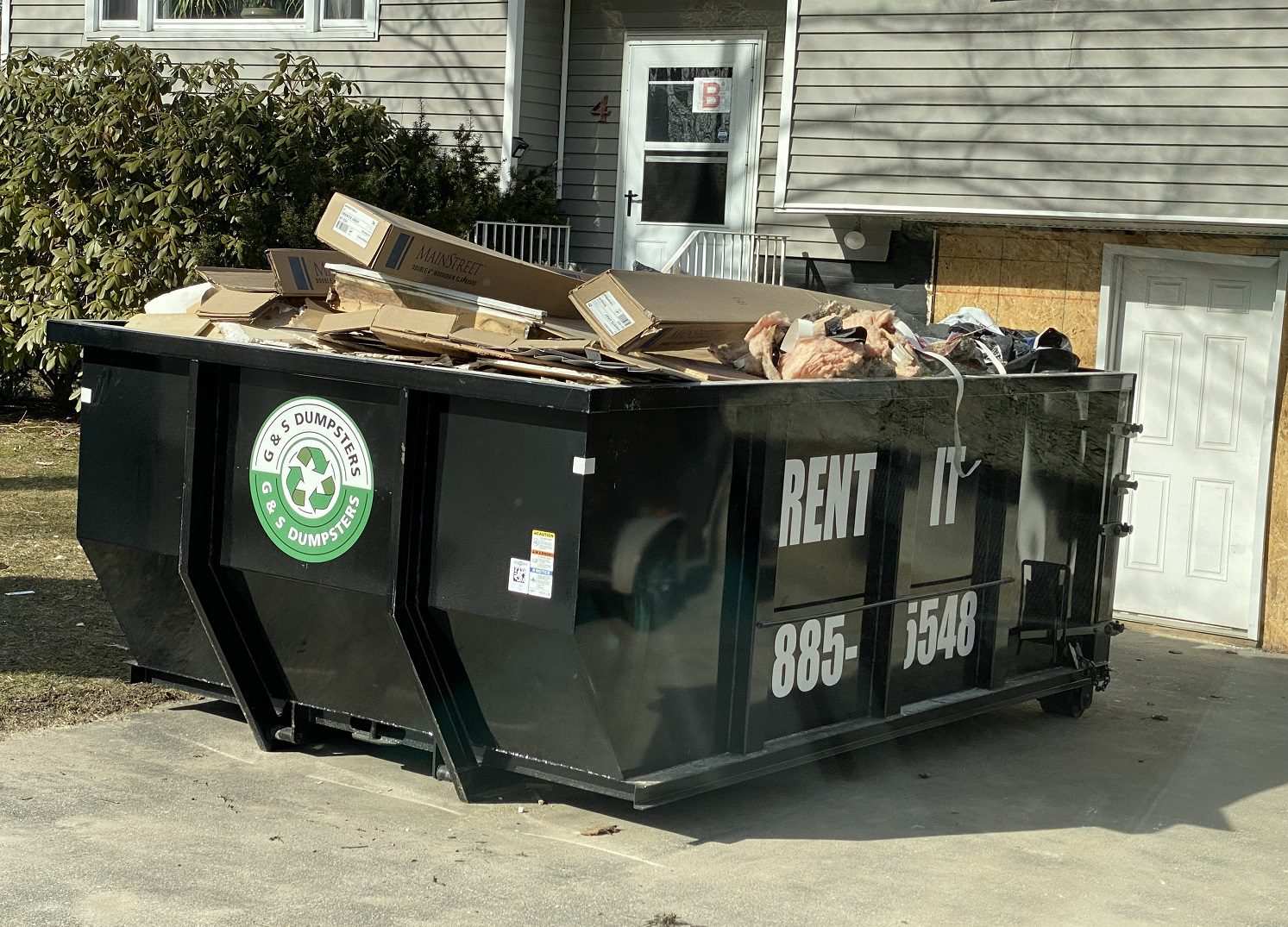 GSDumps filled dumpster ready for pickup